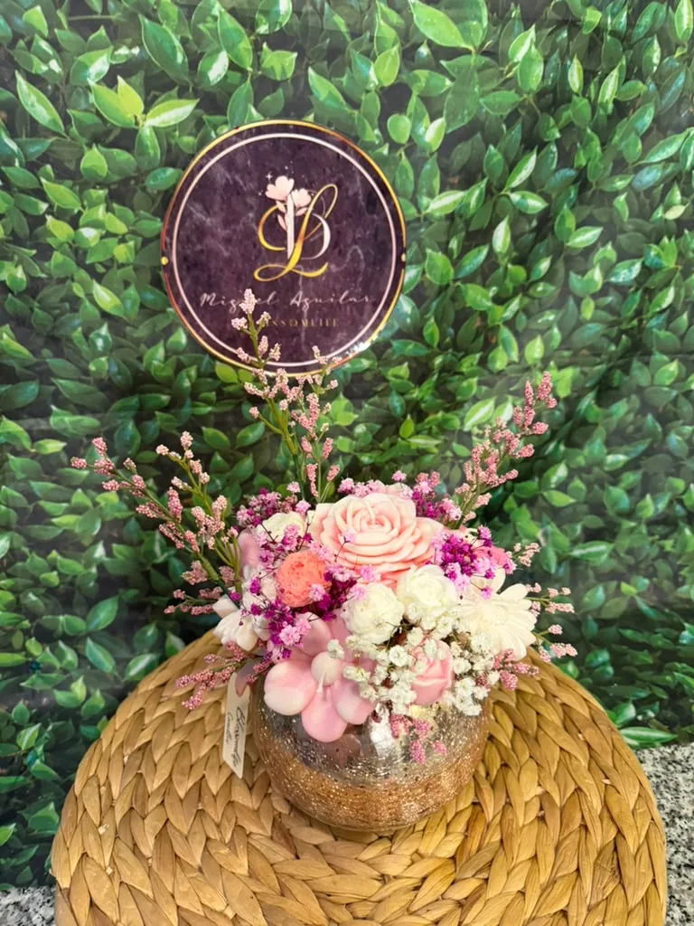 Pink and white everlasting bouquet in a glass vase