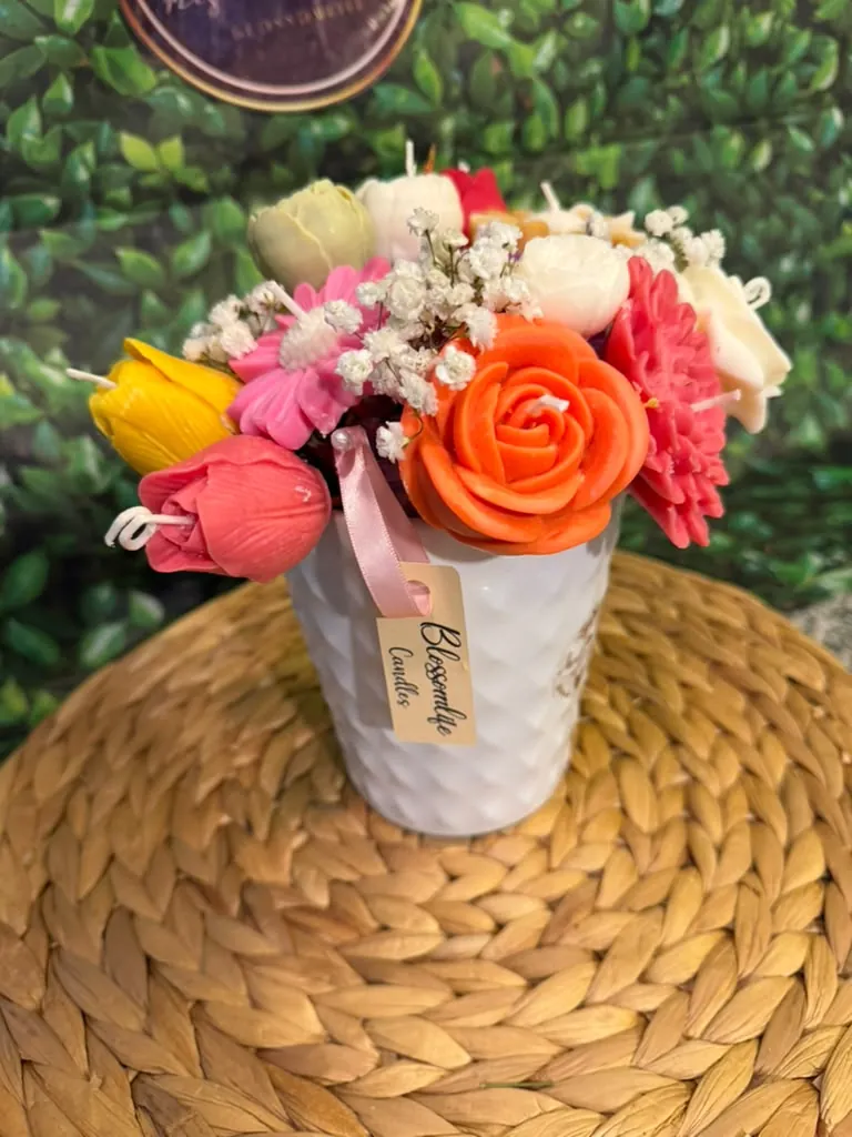 White heart-shaped box with orange and pink everlasting roses