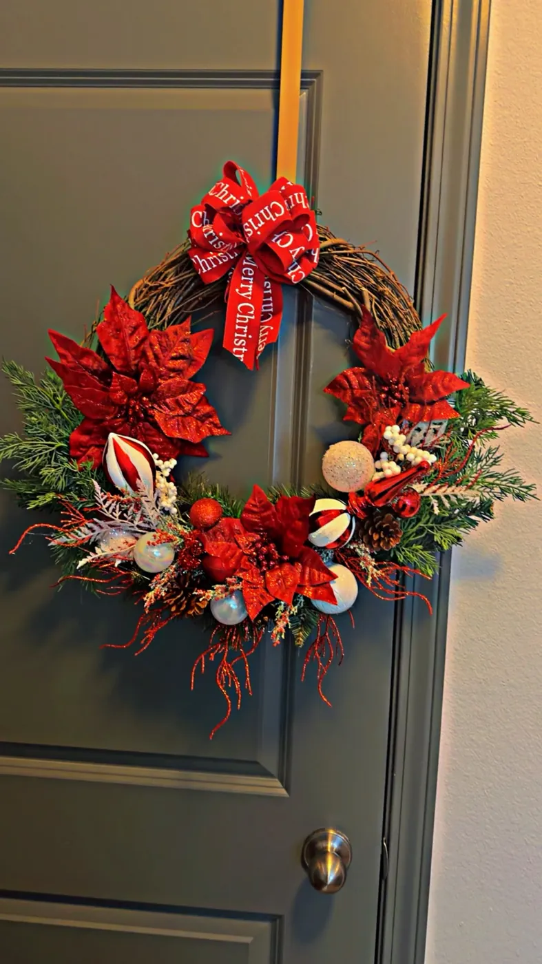 Winter door swag with greenery, snowflakes, and plaid ribbon